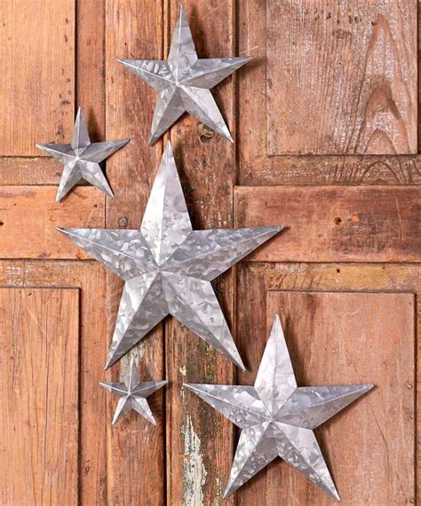 hanging a metal star on a house|rustic metal stars wall decor.